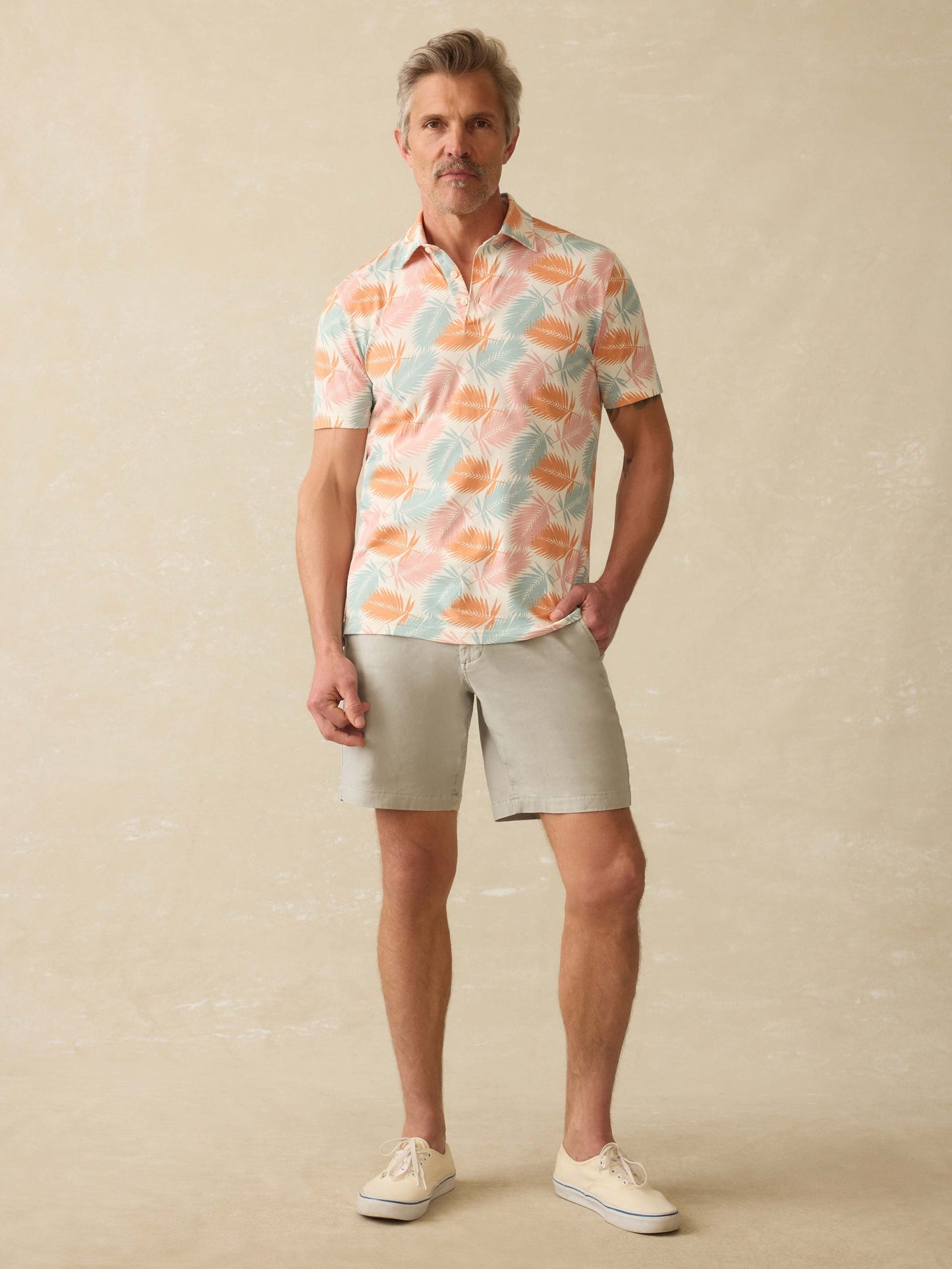 Short-Sleeve MovementTM Pique Polo - Ivory Paradise Palm