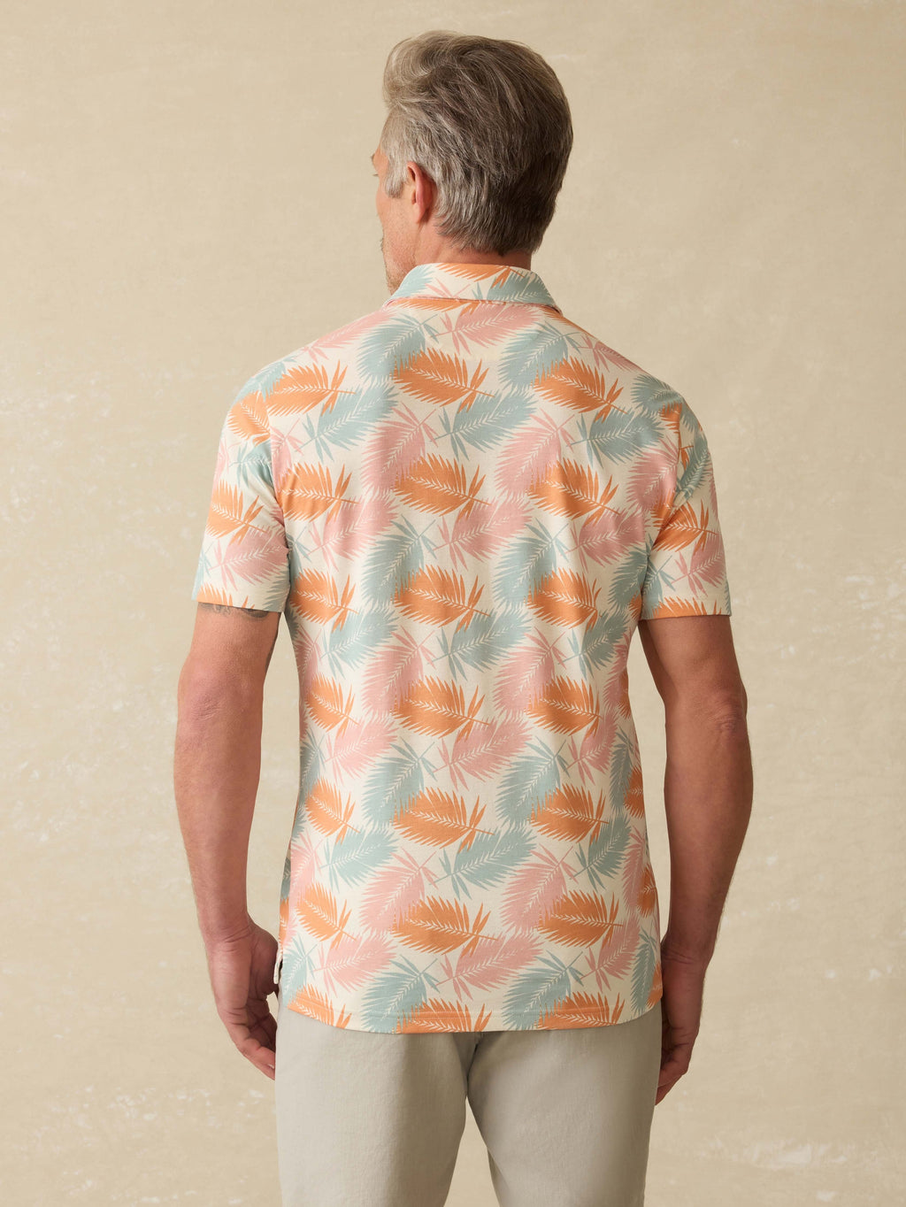 Short-Sleeve MovementTM Pique Polo - Ivory Paradise Palm