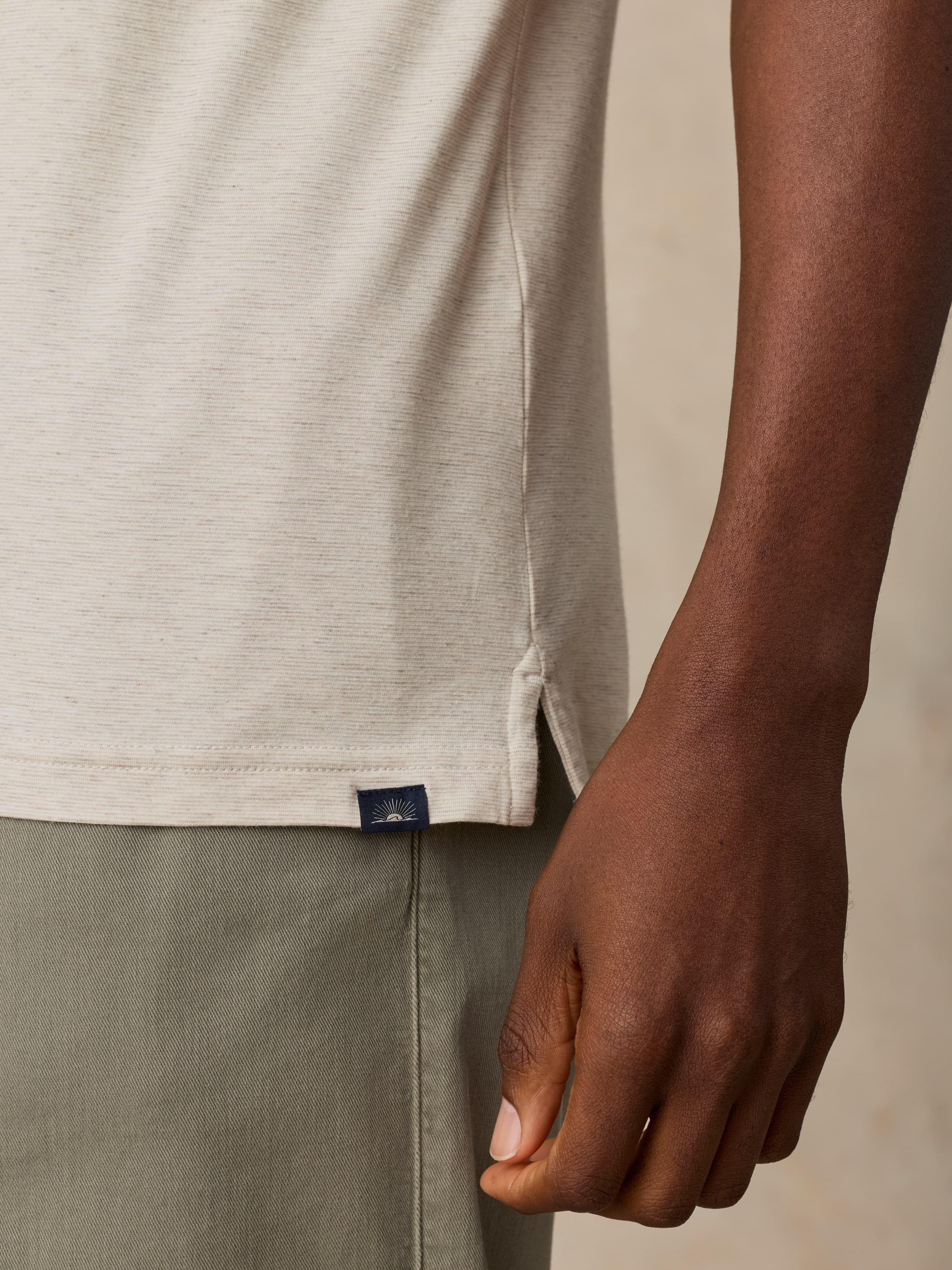 Short-Sleeve MovementTM Polo - Shore Sand Feeder