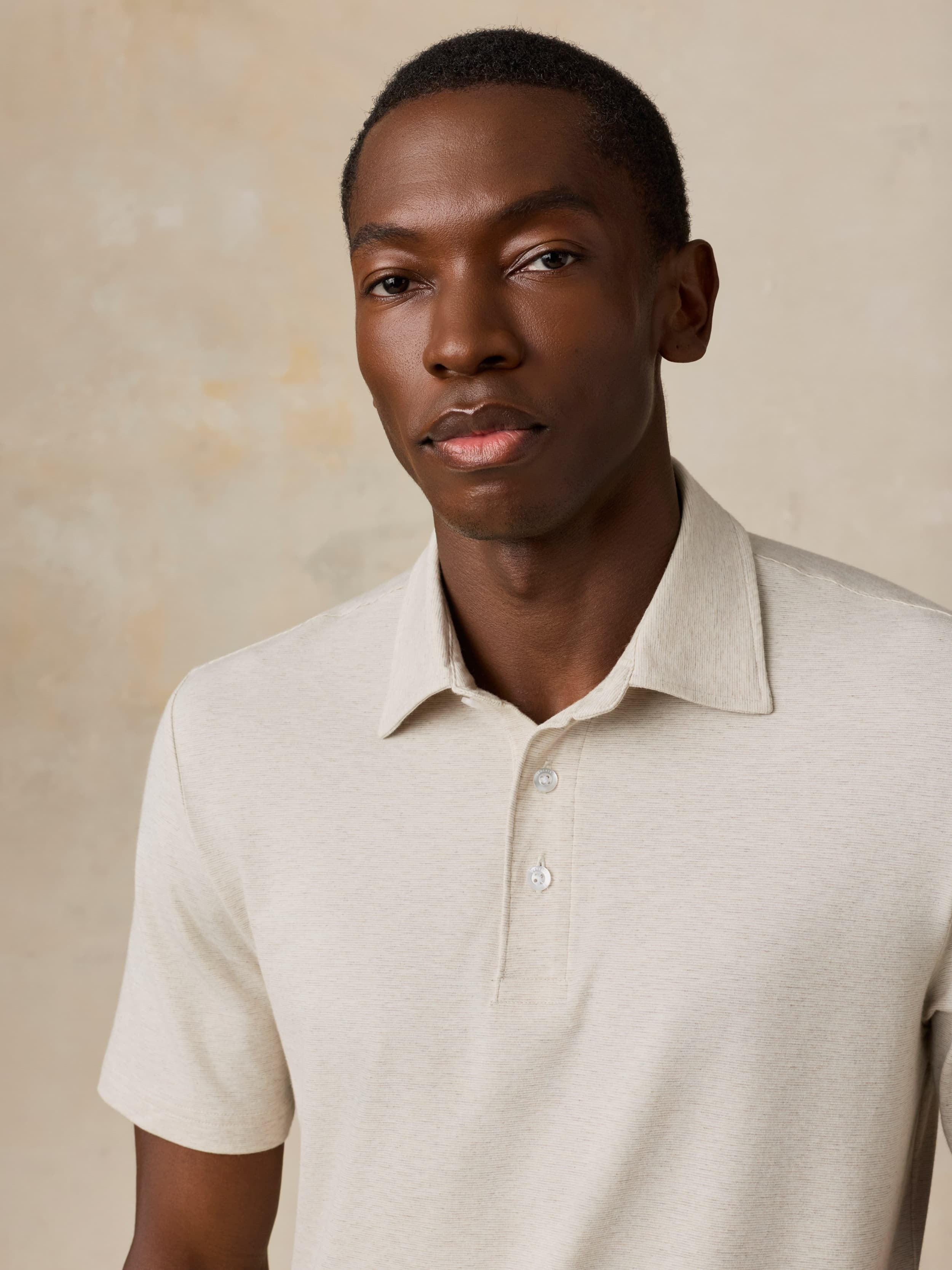 Short-Sleeve MovementTM Polo - Shore Sand Feeder